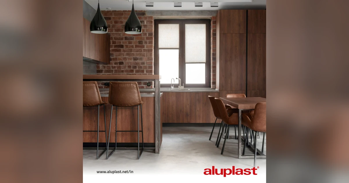 aluplast window with brown wood-effect foil finish in modern kitchen interior with brick wall and bar stools