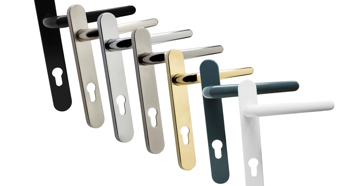 Seven Mila ProCore 220mm door handles in different finishes including white, satin black, chrome, polished gold and anthracite grey arranged in a row
